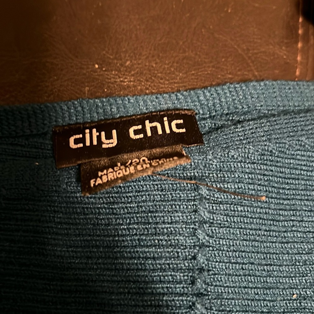 Asymmetrical city chic sweater